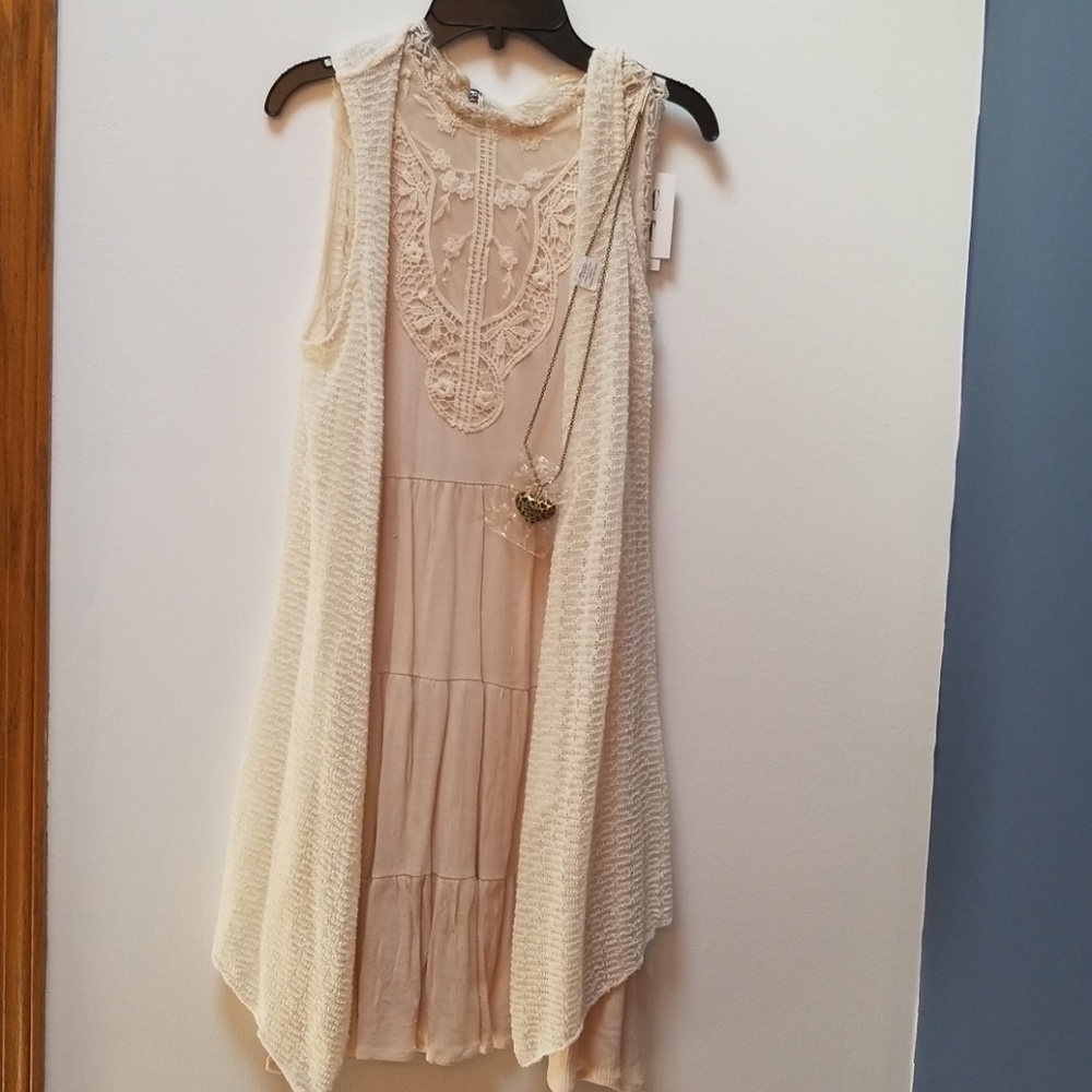 Dress with shawl and heart necklace